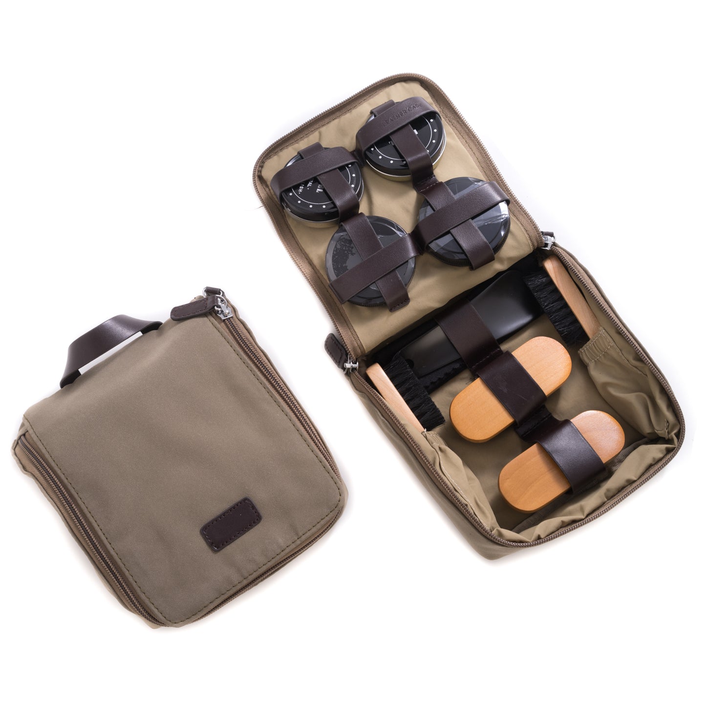 Occasion Gallery Suede/Brown Color Shoe Shine Kit in Ultra Suede & Brown Leather Zippered Case. Includes Two Polishes, Shine Sponge, Shoe Horn, Polishing Rag and Four Brushes. 7 L x 6.5 W x 2 H in.