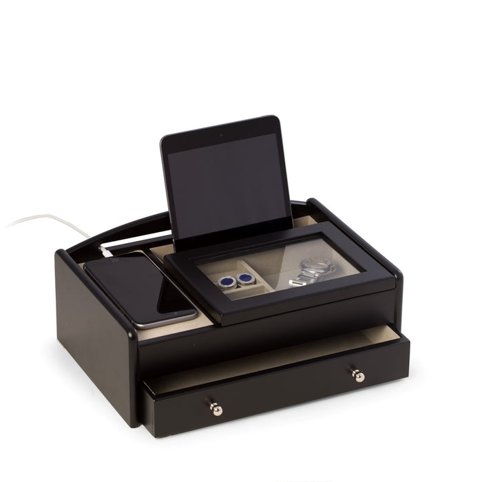 Occasion Gallery Matte Black Wood Valet Box. Storage Compartment w/ Glass Lid, Slot for Tablet Storage, Cell Phone Storage Tray, Opening on Back for Charging Cords, Storage Drawer & Velour Lined w/ Brass Accents. 11.25 L x 7.5 W x 4 H in.