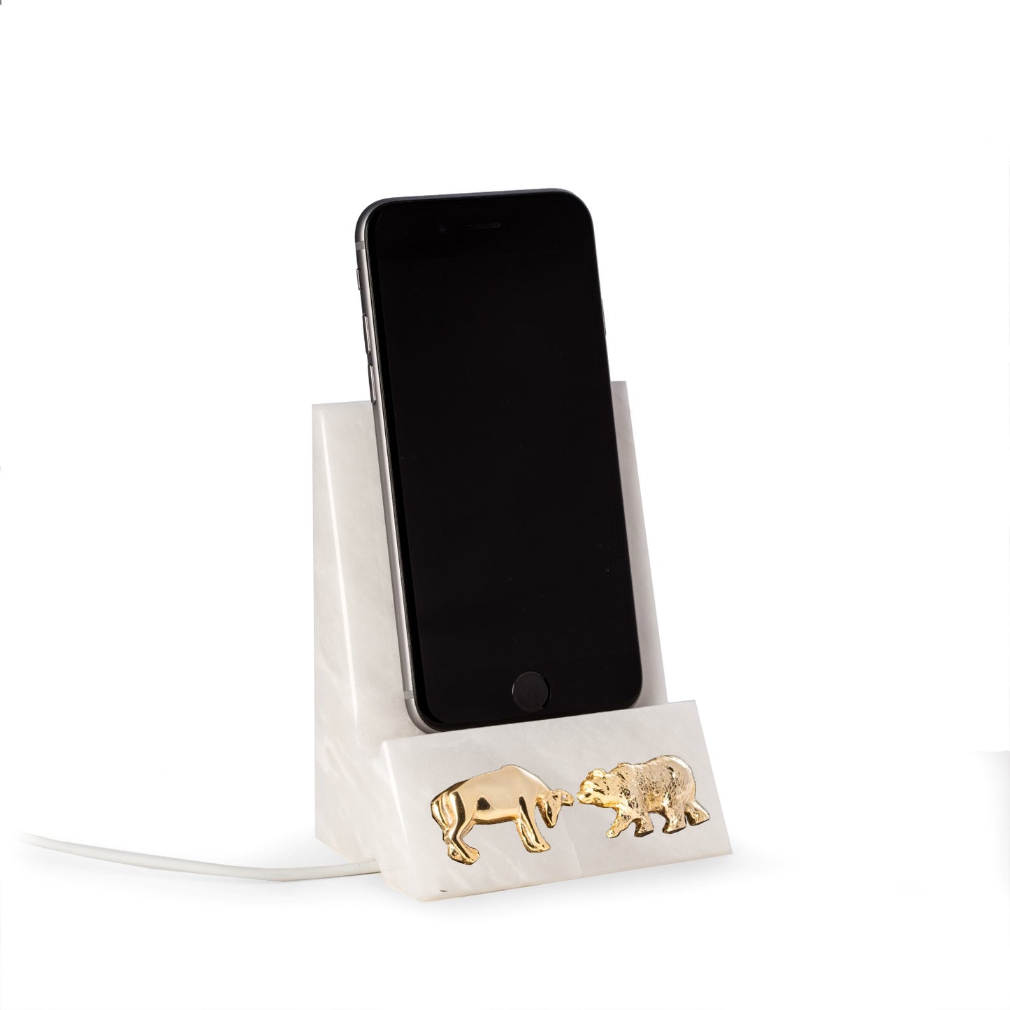 Occasion Gallery WHITE Color White Marble Desktop Phone / Tablet Cradle with a Pass-thru Hole for Charging Cable. With Brass Bull and Bear Insignia. 3.25 L x 2.5 W x 4.5 H in.