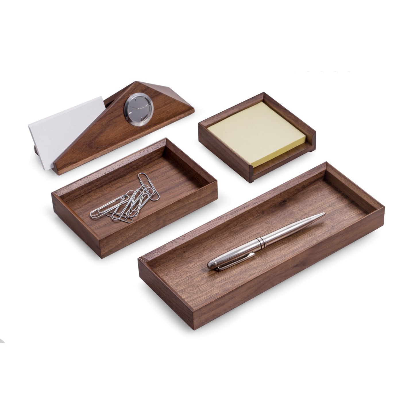 Occasion Gallery Walnut Color Four Piece Walnut Wood Desk Set. Includes Business Card Holder with Quartz Clock, Pen Tray, Accessory Tray and Sticky Note Holder. 9.25 L x 3.65 W x 1.25 H in.
