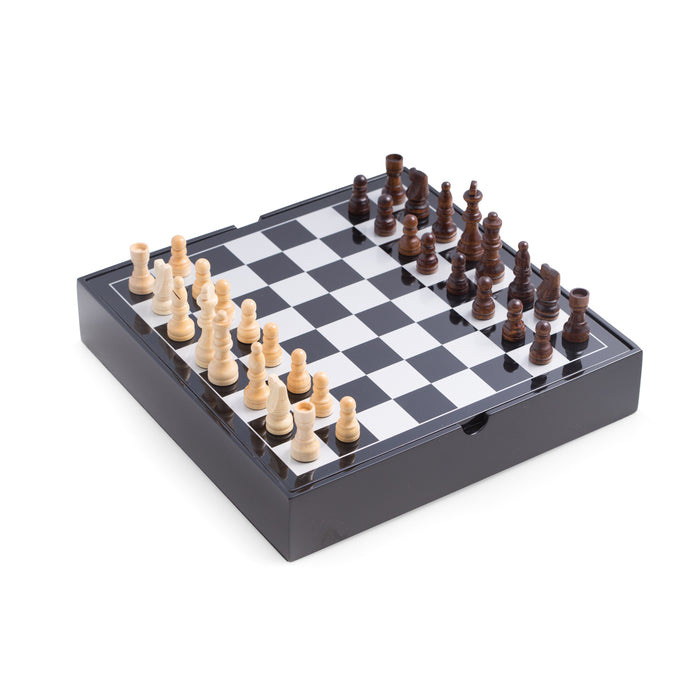 Occasion Gallery Black Color Black Lacquered Wood Multi Game Set. Includes Chess and Backgammon with Wooded Game Pieces and Dice Cup, Dominos, Cribbage, Poker Dice and Playing Cards. 11.5 L x 11.5 W x 2.25 H in.