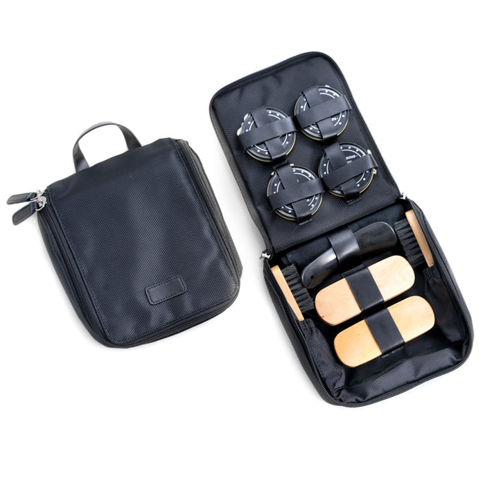 Occasion Gallery Black Color Shoe Shine Kit in Black Ballistic Nylon Zippered Case. Includes Two Polishes, Shine Sponge, Shoe Horn, Polishing Rag and Four Brushes. 7 L x 6.5 W x 2 H in.