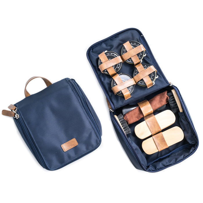 Occasion Gallery Blue Color Shoe Shine Kit in Blue Ballistic Nylon with Brown Accented Zippered Case. Includes Two Polishes, Shine Sponge, Shoe Horn, Polishing Rag and Four Brushes. 7 L x 6.5 W x 2 H in.