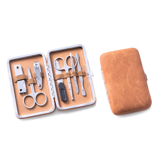 Occasion Gallery Tan Color 9 Pieces Manicure Set with Small Nail Clipper, Nail File, Cuticle and Nose Scissors, Cuticle Cleaner, Tweezers and a 3 Piece Tool Set with Knife, Small File & Can Opener in a Tan Ultra Suede Case. 3 L x 4.75 W x 0.75 H in.