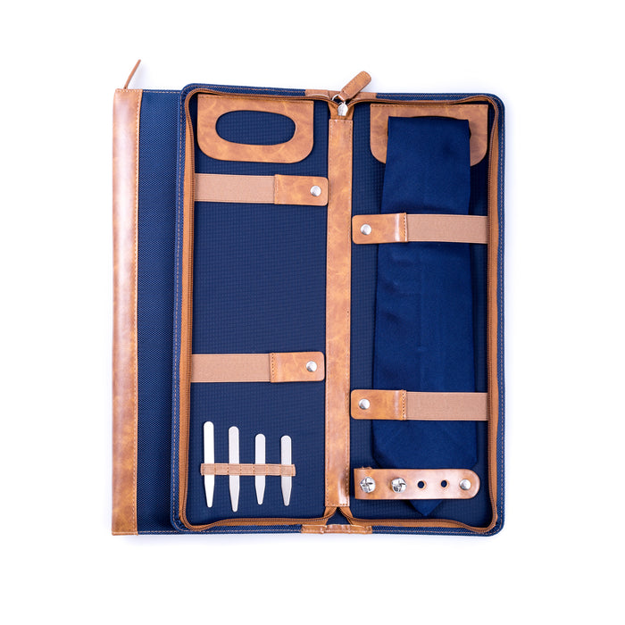 Occasion Gallery Blue Color Ballistic Blue Nylon Travel Tie Case with Brown Accents. Includes 4 Collar Stays and Slots for 4 Cufflinks with Zipper Closure 5 L x 16.5 W x 1 H in.