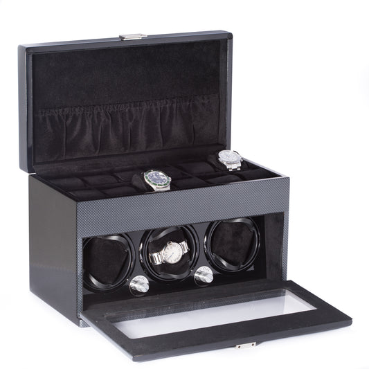 Occasion Gallery Lacquered "Carbon Fiber" Steel Gray 3 Watch Winder w/ Multiple Pre-programed Settings & Storage for 12 Watches on Top. Soft Velour Lined for a Scratch Free Surface & a Push Tab Clasp. Works on AC Power.  14 L x 7.5 W x 9 H in.
