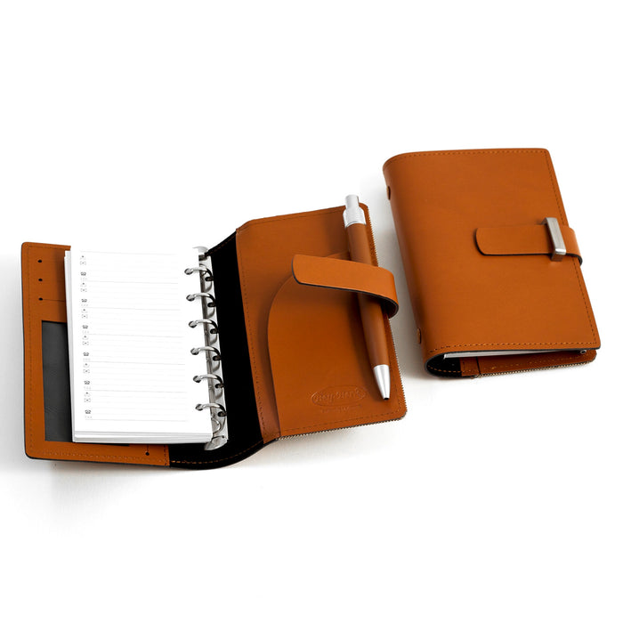 Occasion Gallery Saddle Color Saddle Leather Agenda Book with Ball Point Pen, Six Ring Binder, Slots for Cards and ID Window. 4 L x 1 W x 6 H in.