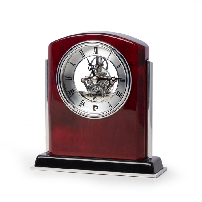 Occasion Gallery Rosewood/Silver Color Lacquered Mahogany Wood Skeleton Movement Clock with Stainless Steel Accents. 6.5 L x 2 W x 6.75 H in.