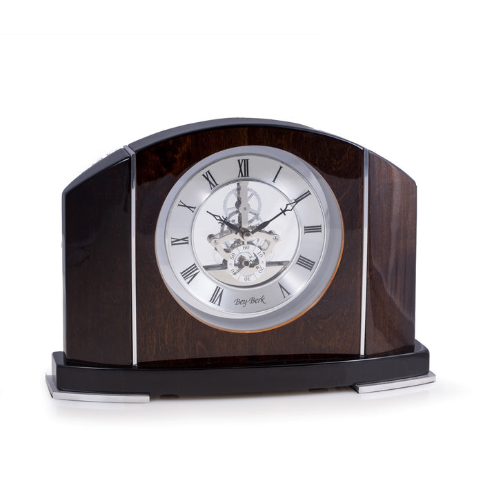 Occasion Gallery Walnut Wood/Silver Color "Cairo", Lacquered "Walnut" Wood and Stainless Steel Accents Quartz Clock with Skelton Movement. 12 L x 3 W x 8.25 H in.