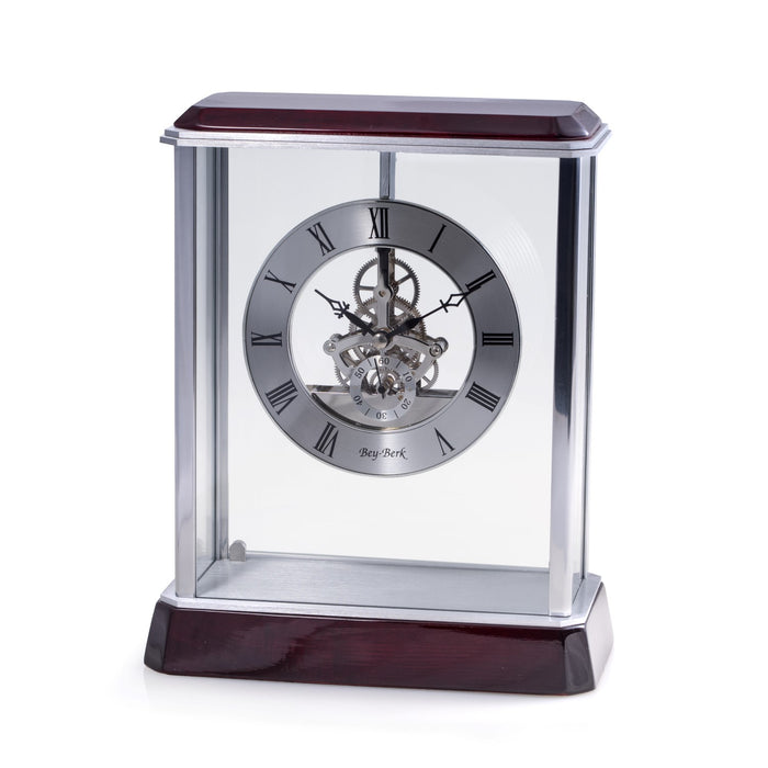 Occasion Gallery Rosewood/Silver Color "Madrid", Lacquered "Rosewood" and Stainless Steel Accents Quartz Clock with Skelton Movement. 8 L x 4.25 W x 10.25 H in.