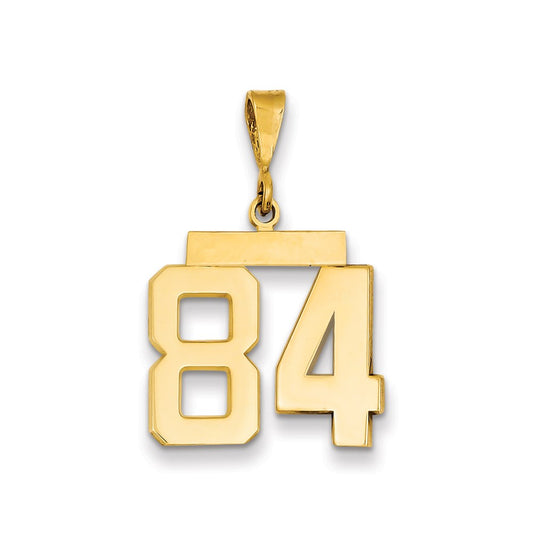 Dije Million Charms número 84 de oro amarillo de 14 quilates, mediano y pulido