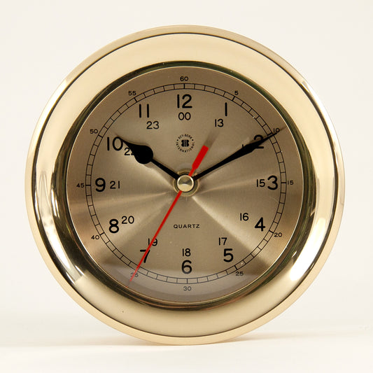 Occasion Gallery Gold Color Lacquered Brass Round Quartz Clock with Beveled Glass. 6.25 L x 2.5 W x  H in.