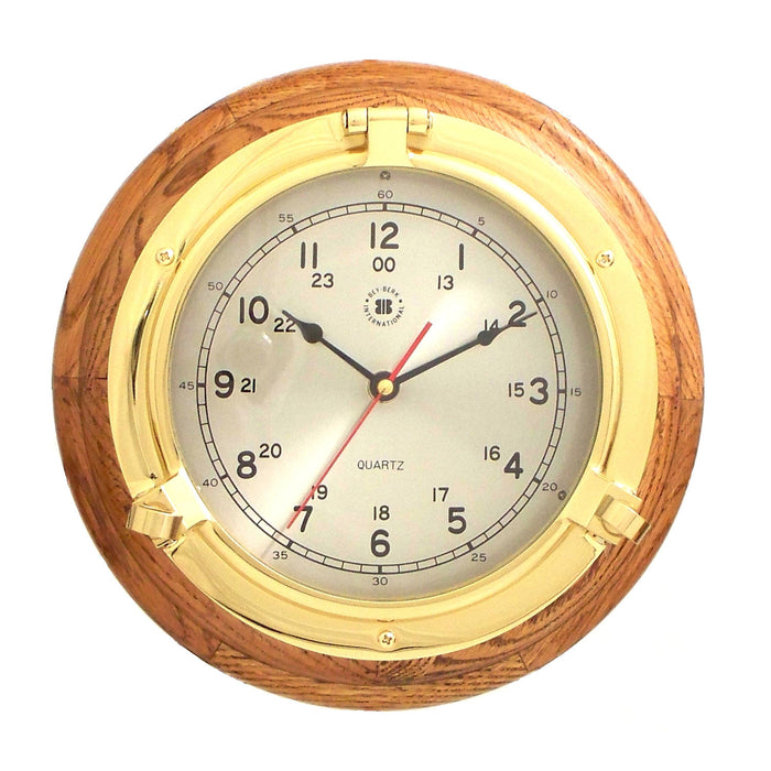 Occasion Gallery Oak Wood/Gold Color Lacquered Brass Porthole Quartz Clock on Oak Wood. 9.5 L x 2 W x  H in.
