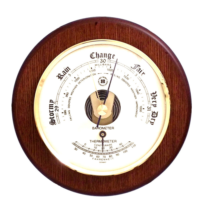 Occasion Gallery Cherry Wood Color Barometer with Thermometer on 5" Cherry Wood with Brass Bezel. 5.35 L x 1.75 W x  H in.