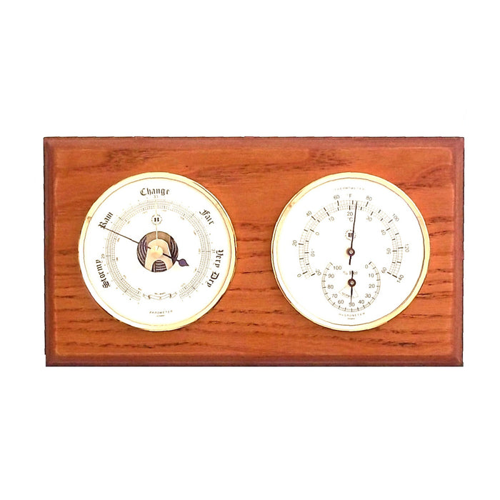Occasion Gallery Oak Wood Color Barometer and Thermometer with Hygrometer on Oak Wood with Brass Bezel. Wall Mounts Vertically or Horizontally. 6 L x 2 W x 11 H in.