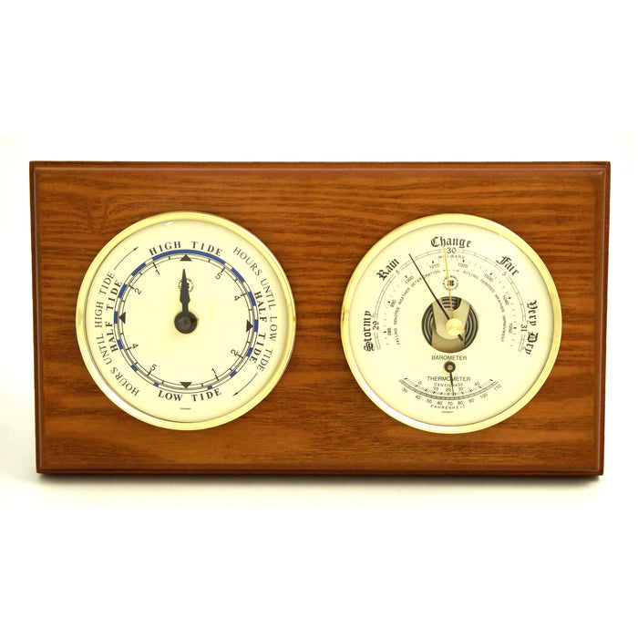 Occasion Gallery Oak Wood Color Tide Clock and Barometer with Thermometer on Oak Wood with Brass Bezel. Wall Mounts Vertically or Horizontally. 6 L x 2 W x 11 H in.